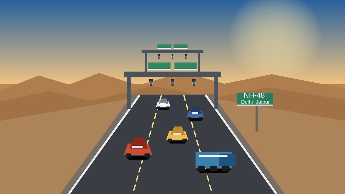 Barrier-free MLFF toll gantry on the Delhi-Jaipur section of NH-48 with moving cars and a truck in a Rajasthan highway setting